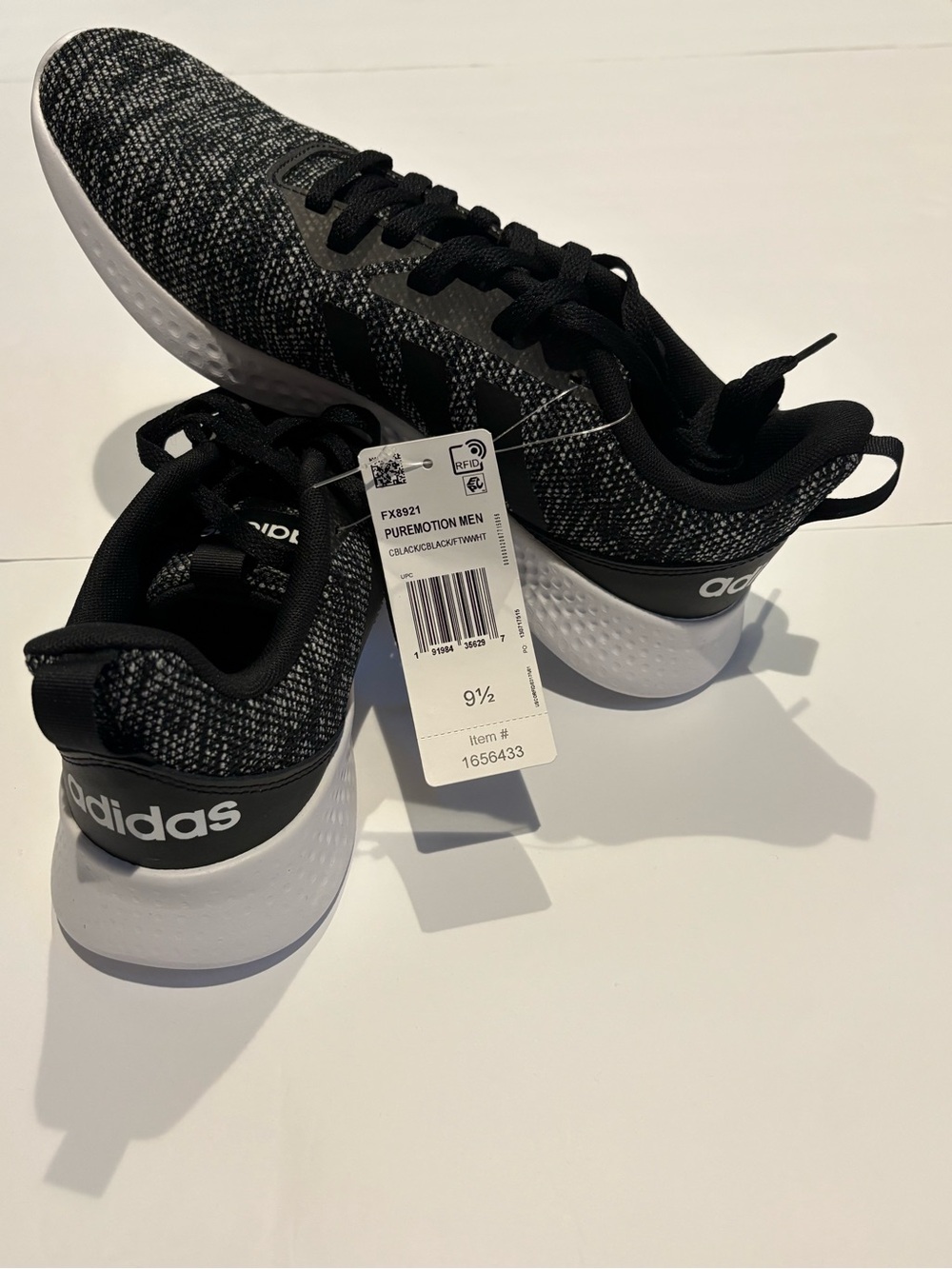 Adidas Puremotion men’s  Black & White Knit Trainer Sneakers